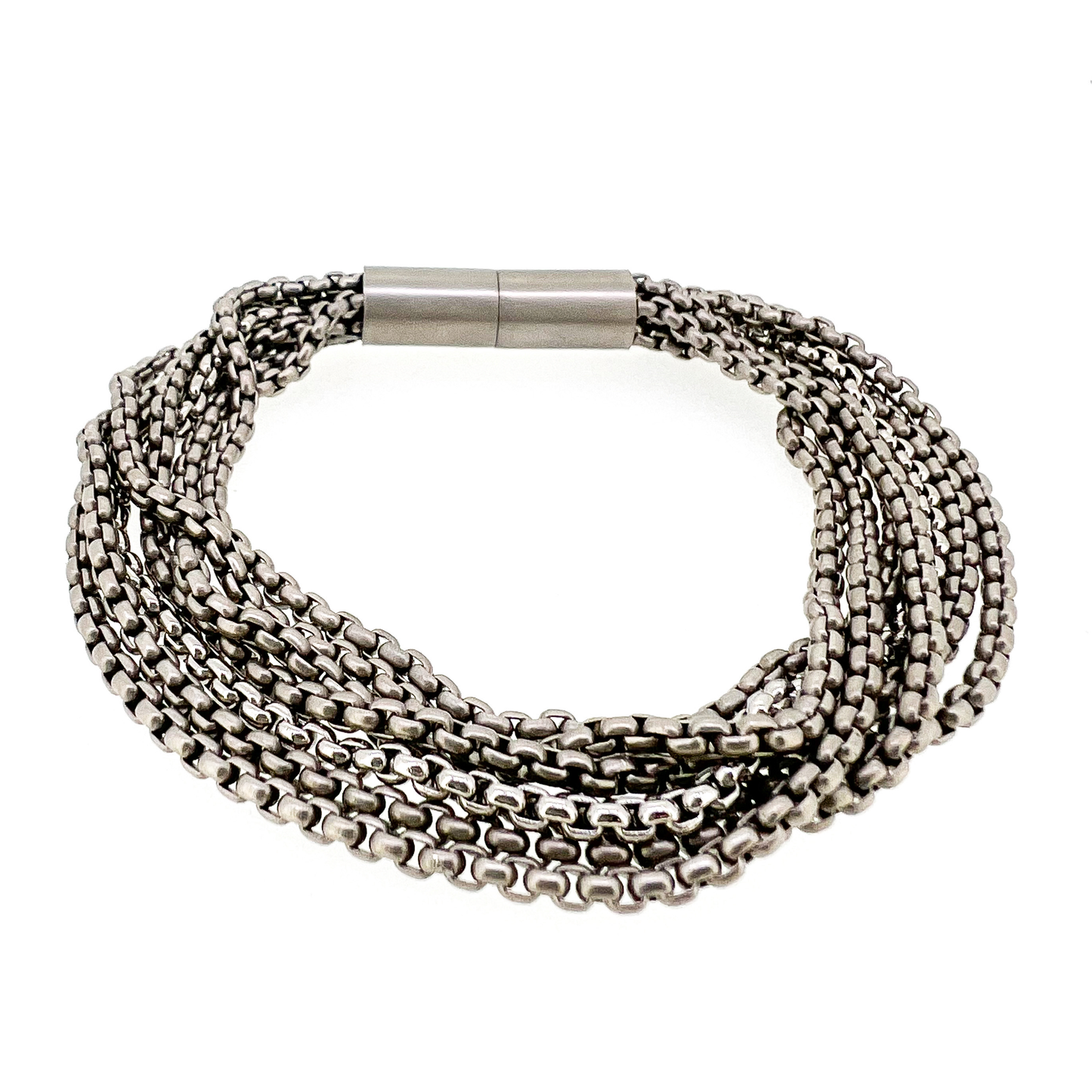 Titanium bracelet made of 7 titanium chains - 6 sandblasted and one polished with sandblasted titanium magnetic lock. Diameter 9mm. Made and designed by Zeezen.