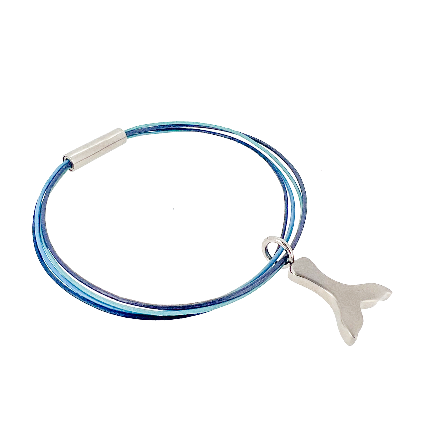 Northern lights leather bracelet with titanium magnetic lock and titanium wale tail charm. Designed by Bolli Ófeigsson made by Zeezen.