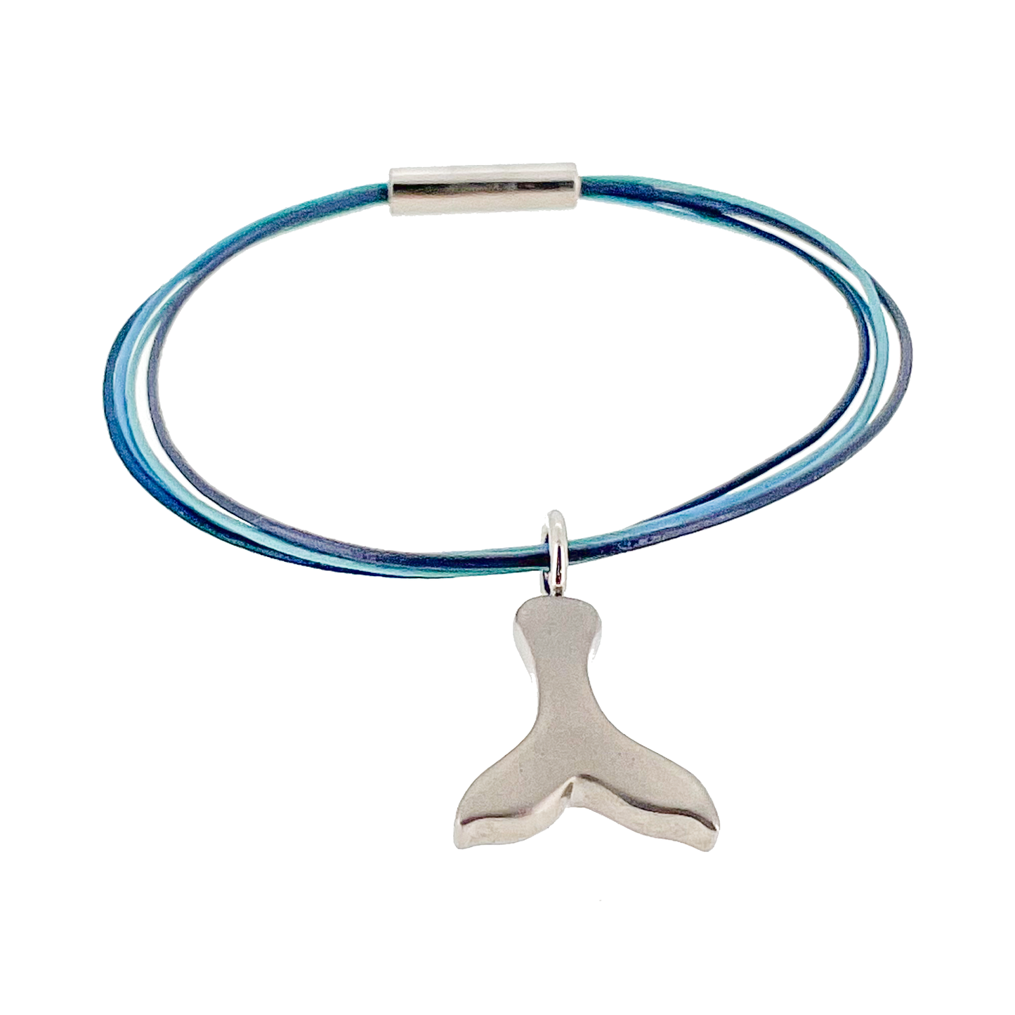 Northern lights leather bracelet with titanium magnetic lock and titanium wale tail charm. Designed by Bolli Ófeigsson made by Zeezen.