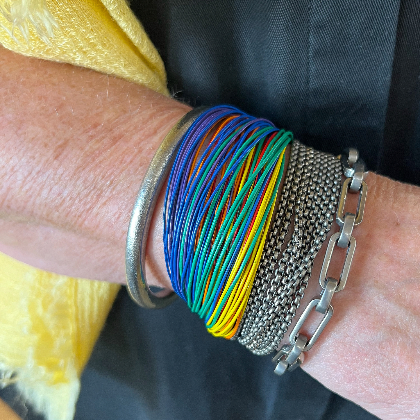 Rainbow Street Leather Bracelet - 6 colors 75 leather strands (orange, yellow, red, green, blue, purple) leather 0.5mm with 6mm titanium magnetic lock - surface polished. Designed and handmade by Zeezen